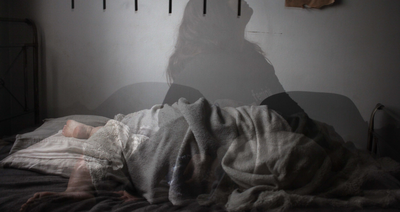 Woman in and out of insomnia